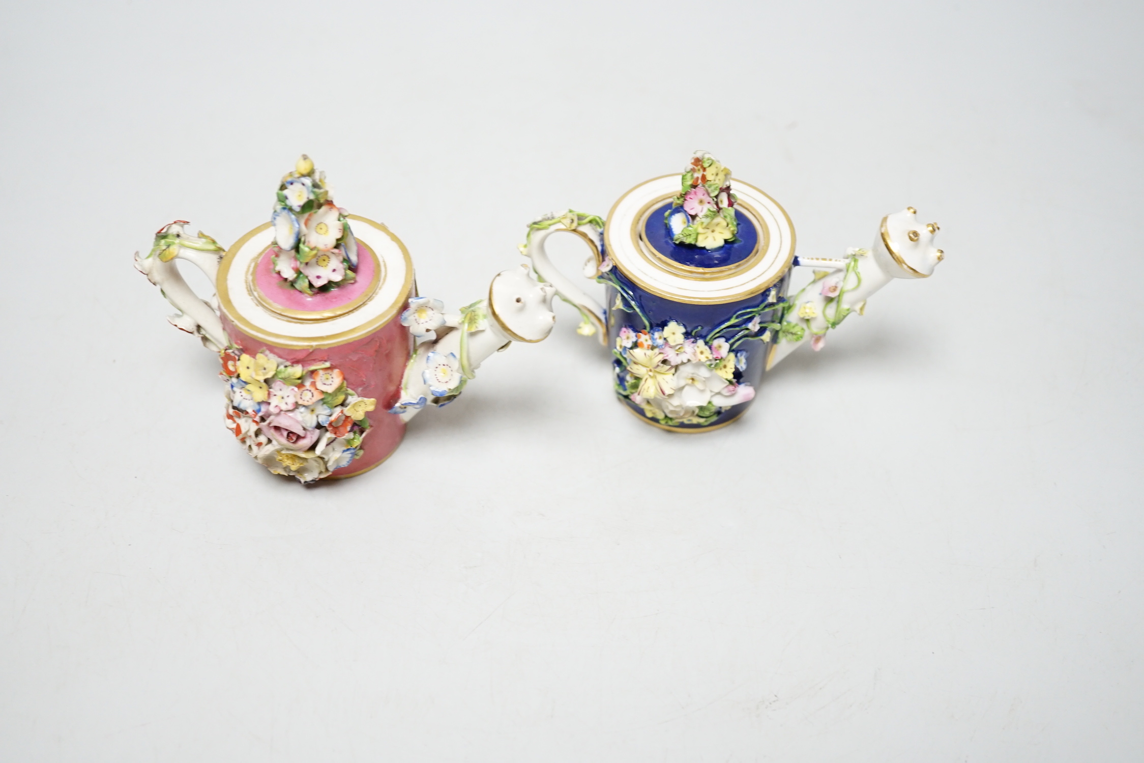 Two Derby porcelain floral encrusted miniature water sprinklers, circa 1825, tallest 10cm